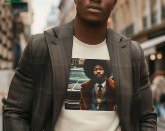 May include: A cream t-shirt with a retro image of a man in a suit and gold chains, with an afro. The t-shirt is worn under a gray blazer. The upper left corner of the image has the text "BLACK PRIDE" with a fist logo.