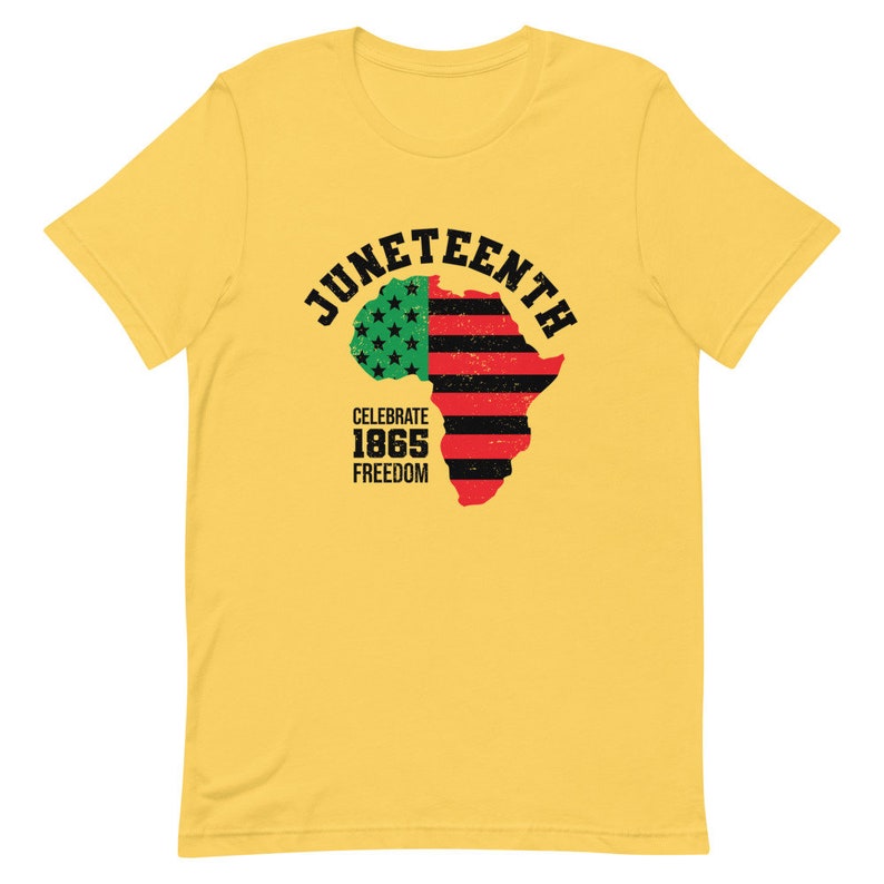 May include: Yellow t-shirt with a black and red graphic of an outline of Africa with a red, white, and blue American flag on the left side. The text "Juneteenth" is in a black arc above the graphic. The text "Celebrate 1865 Freedom" is below the graphic.