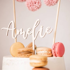 Personalized cake topper with desired name