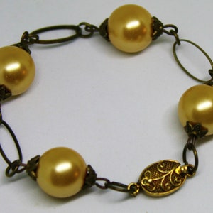 Ancient Bronze Bracelet with Pearls image 1