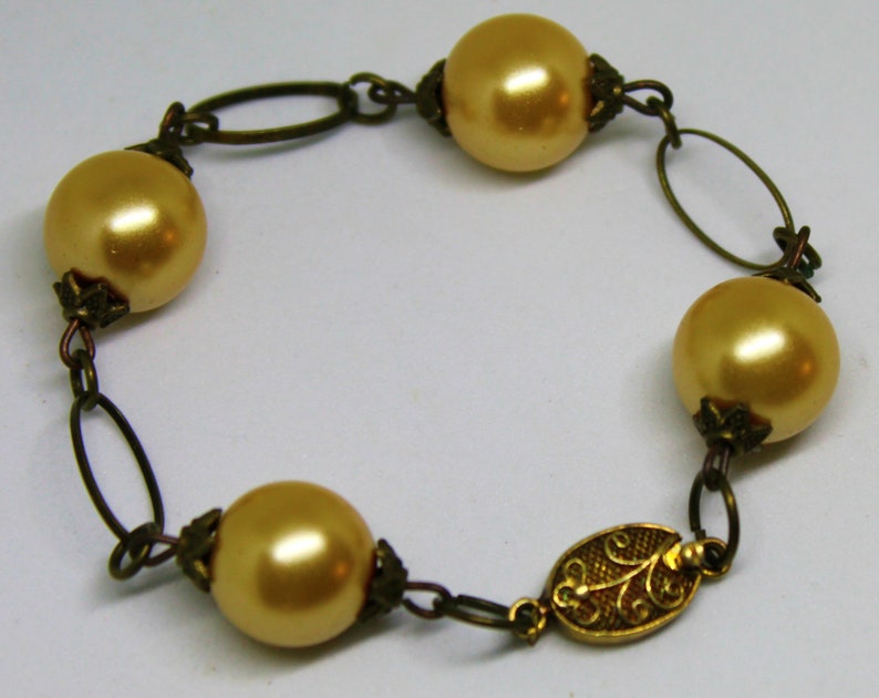 Ancient Bronze Bracelet with Pearls image 1