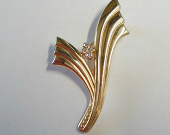 Gold gemstone broche