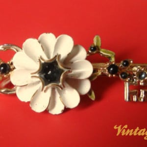 VINTAGE PIN CORO 60's image 1