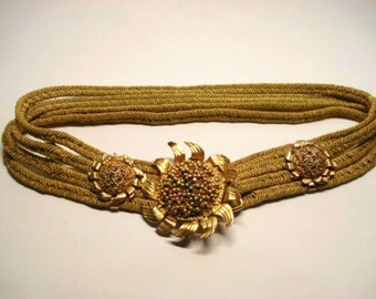 Gouden elastische riem met grote gesp vormige bloem 1950