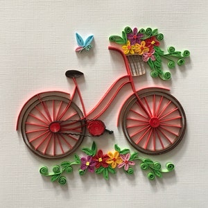 Vélo avec des fleurs, carte de piquant