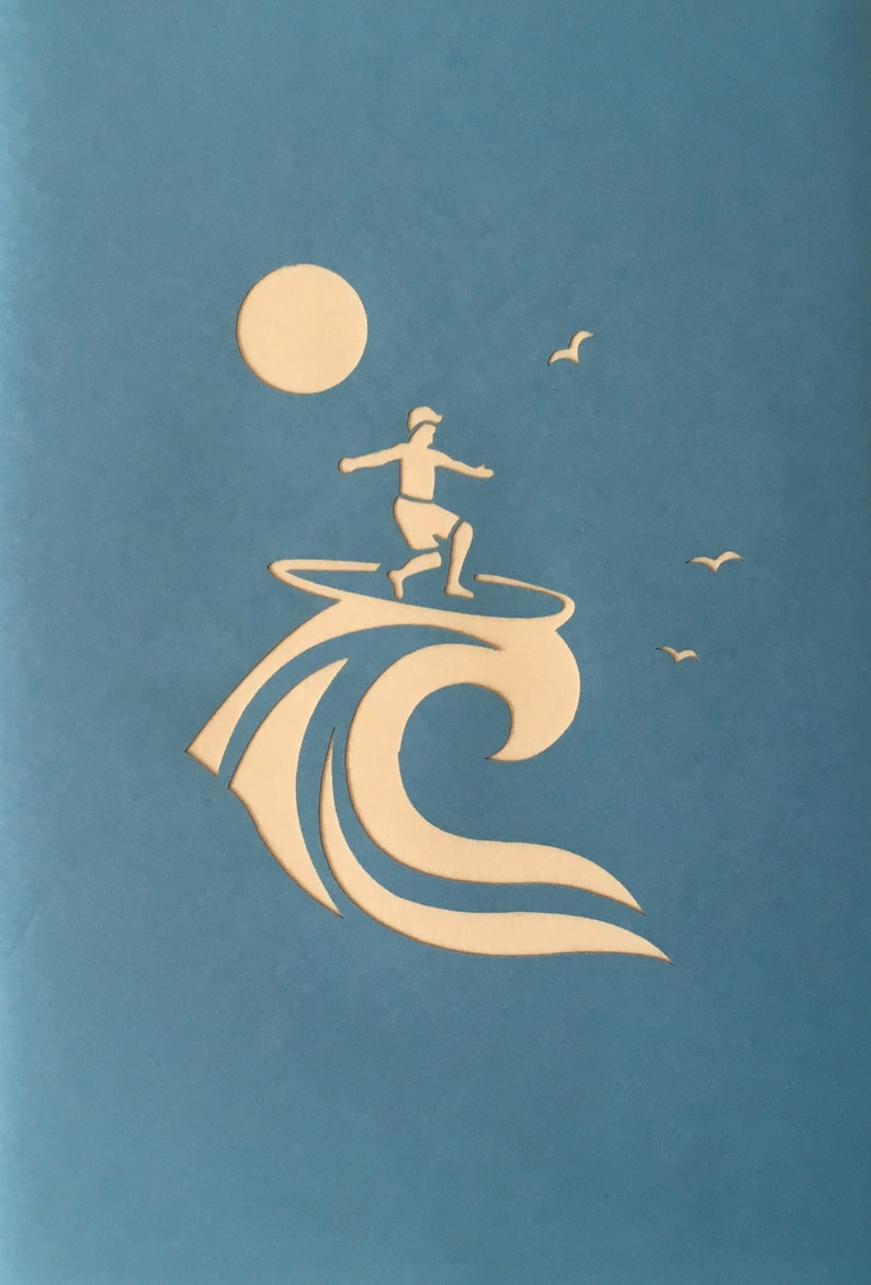 May include: A white silhouette of a person surfing on a wave with a white sun and birds in the background. The image is on a blue background.
