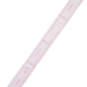 May include: A clear, rectangular plastic ruler featuring a pink grid pattern and pink measurement markings. The ruler includes a circular hole at one end and a semi-circular protractor guide printed in the centre, with markings up to 54 centimetres.
