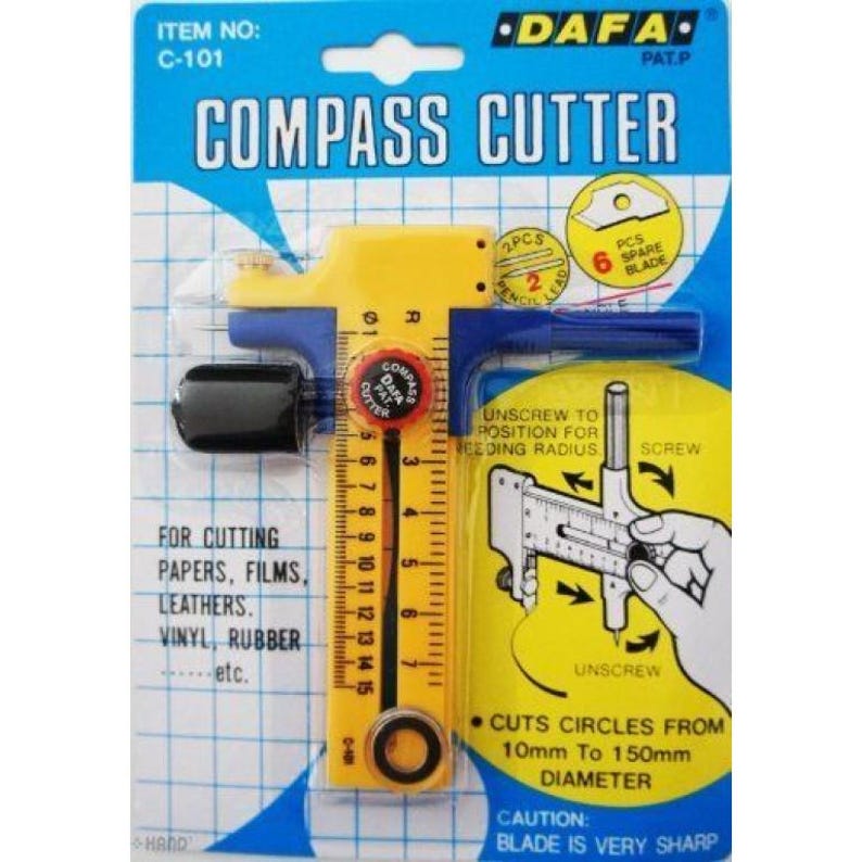 May include: A yellow and blue compass cutter tool for cutting papers, films, leathers, vinyl, and rubber. The package includes spare blades and the tool cuts circles from 10mm to 150mm in diameter. The text on the package reads "Compass Cutter".