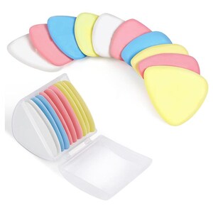 May include: A selection of multi-coloured triangular chalk pieces in white, pink, blue, and yellow. The chalk is arranged in a curved line and also inside a clear plastic case with a lid. The chalk is likely used for sewing or crafting.