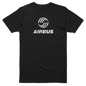 May include: A black t-shirt with a silver Airbus logo and the word "AIRBUS" printed on the front.