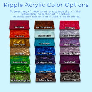 a group of different colors of fabric on a blue background