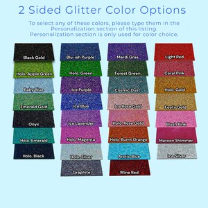 a group of different colors of glitter paper