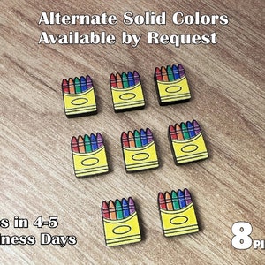 May include: Eight colorful crayon boxes with a rainbow of crayons inside. The boxes are yellow with black outlines and a white oval in the center. The text "Alternate Solid Colors Available by Request" is at the top of the image. The text "Ships in 4-5 Business Days" is at the bottom left of the image. The text "8 PIECES" is at the bottom right of the image.