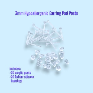 May include: A close-up of a pile of clear plastic earring posts and backs. The text "3mm Hypoallergenic Earring Pad Posts" is at the top of the image. The text "Includes: -20 acrylic posts -20 Rubber silicone backings" is at the bottom of the image.