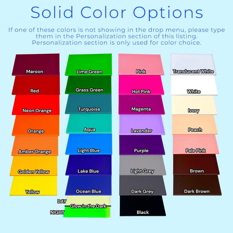 a group of different colors of paper on a blue background