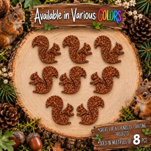 May include: Eight brown glitter squirrel-shaped cutouts arranged on a wooden slice. The text reads: Available in Various COLORS, GREAT FOR ALL KINDS OF CRAFTING PROJECTS, SOLD IN MULTIPLES OF 8 PCS. The squirrels have textured, sparkling surfaces.