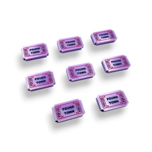 May include: Eight purple ticket-shaped tokens with the text "POUND TOWN" and the number "021424" printed on them.