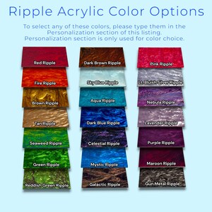 a group of different colors of fabric on a blue background