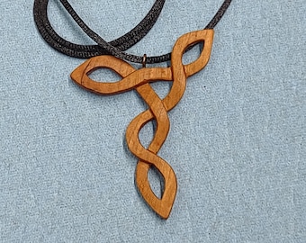 Hand Carved Cherry Wood Mystery Knot Necklace: Adjustable Silk Cord