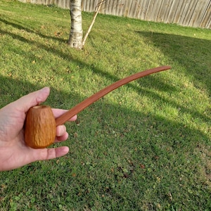 Item 1051 - a 16-1/2&quot; long wizard tobacco pipe