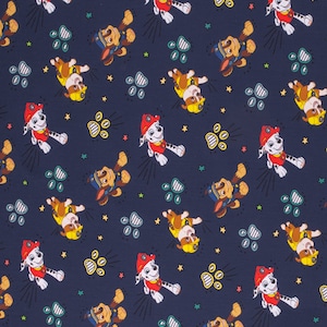 May include: Navy blue fabric with a repeating pattern of cartoon dog characters. The dogs are in red, yellow, and brown, with paw prints and stars scattered across the background.