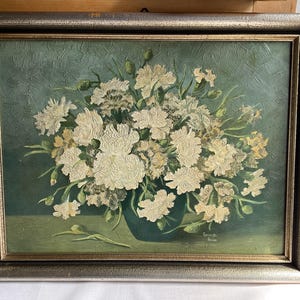 Antique picture of a bouquet of carnations in a wooden frame