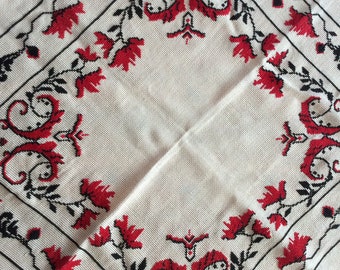 Tablecloth embroidered with black and red cross stitch