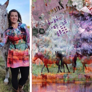 May include: A woman wearing a colourful dress with a horse print stands next to a white and brown horse. The dress has a hood and a loose fit. The background is a blurred image of a field with horses in the distance.