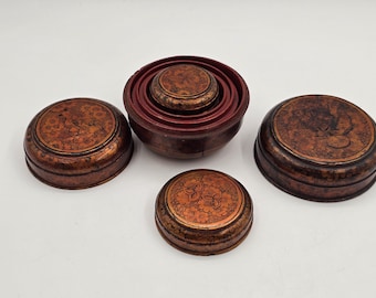Four nested Chinese lacquer boxes
