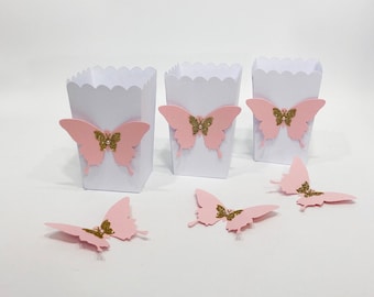 Cajas de regalo con forma de mariposa: Decoración para baby shower en rosa y dorado