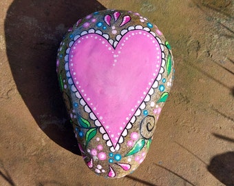 painted decorative stone with a playful heart