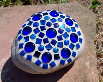 Decorative stone with mosaic mandala in blue