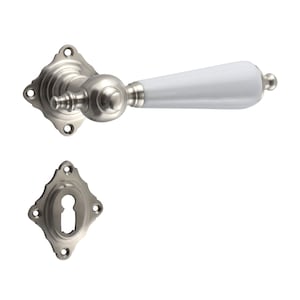 May include: A white ceramic door handle with a nickel finish. The handle has a rounded shape and a square base. The handle is attached to a nickel keyhole cover.