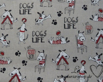 May include: A beige fabric with a repeating pattern of cartoon dogs. The dogs are in various poses, including playing fetch, sitting on chairs, and sleeping. The fabric has the text "Dogs Life" repeated throughout.
