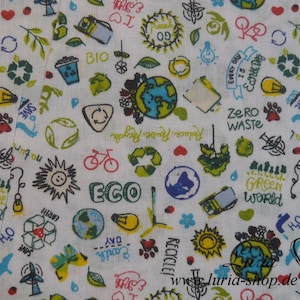May include: White fabric with a repeating pattern of green, blue, and yellow eco-friendly symbols. The symbols include a globe, a recycling symbol, a lightbulb, a bicycle, a leaf, a sun, and the words "Zero Waste", "Green World", "Earth Day", "Save", "Bio", "Eco", and "Recycle".