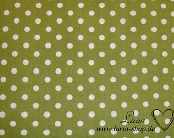 May include: Green fabric with white polka dots. The fabric has a subtle texture and a repeating pattern of white circles on a green background.