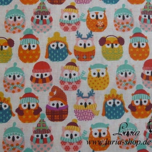 May include: A white fabric with a repeating pattern of colourful owls wearing winter hats, scarves, and earmuffs. The owls are in various colours, including red, orange, yellow, green, blue, and purple. The fabric is ideal for crafting projects, such as quilting, sewing, and scrapbooking.