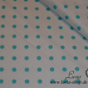 May include: White fabric with a repeating pattern of turquoise blue polka dots.