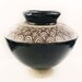 see more listings in the Ceramic vases and cans section