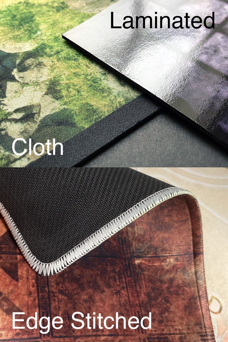 May include: A close-up of a black and white mouse mat with a stitched edge. The mouse mat has a textured surface and is made of cloth. The text "Edge Stitched" is printed on the bottom of the image.