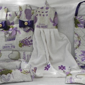 Oven cover, bread bin, pot holders, towel and bag holder