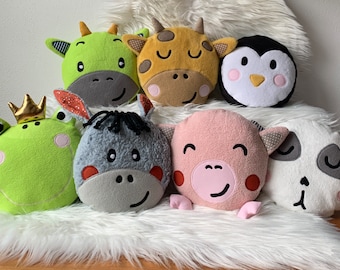 Cuddly animal pillows, plush toys