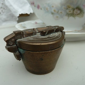 antique mug weights, brass, mug weights