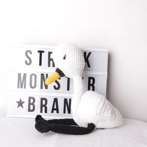 Crochet game clock swan