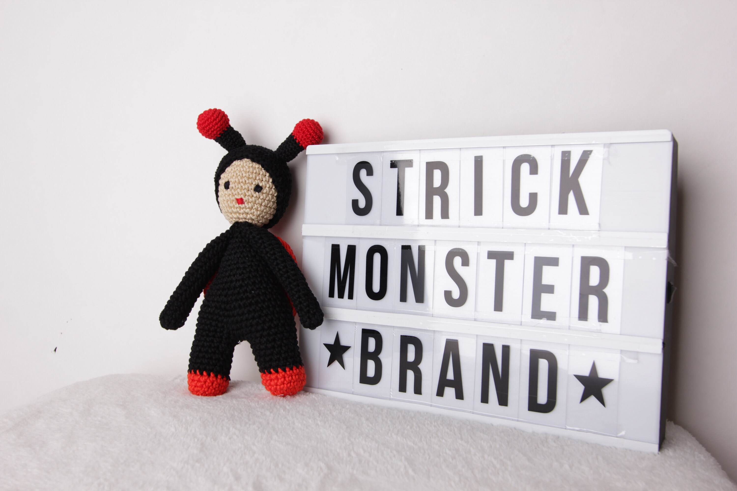 Crochet cuddly toy ladybug