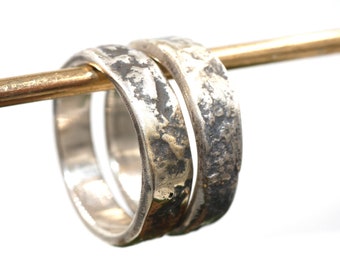 Blackened 925 silver wedding rings, (pair price) with manually worked uneven surface and patina, including handwriting engraving on the inside