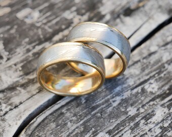 Wedding rings made of Damascus steel, with 750 yellow gold, forged Unnikate - very special wedding rings, couple price