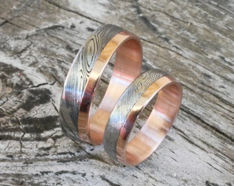 Wedding rings made of damask steel with 585 red gold inside and grain, unique pieces made of forged damask steel, handwritten inside engraving