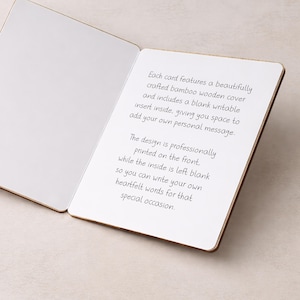 May include: Open bamboo card with text. The card features a blank writable insert. The text on the right page reads: "Each card features a beautifully crafted bamboo wooden cover and includes a blank writable insert inside..."