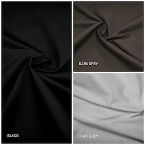 May include: Three fabric swatches in different shades of gray. The swatches are arranged in a grid, with "BLACK" at the bottom left, "DARK GREY" at the top right, and "LIGHT GREY" at the bottom right.